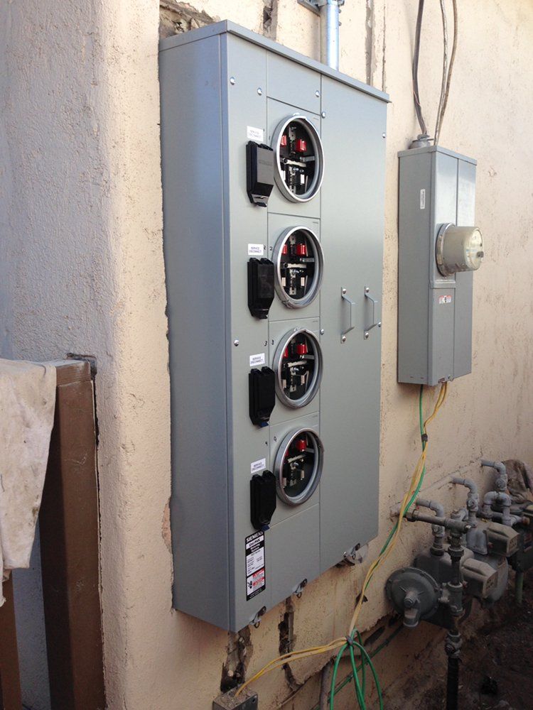 Four-unit meter stack for a multi-family building