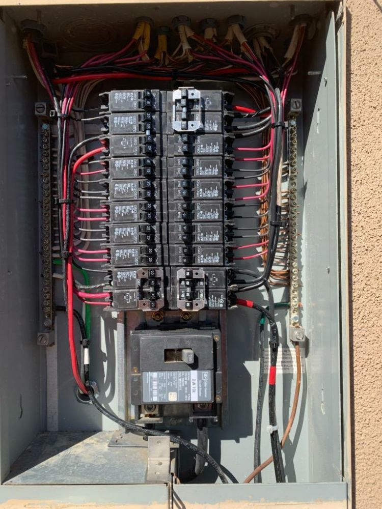 Inside an electrical panel during a troubleshooting call